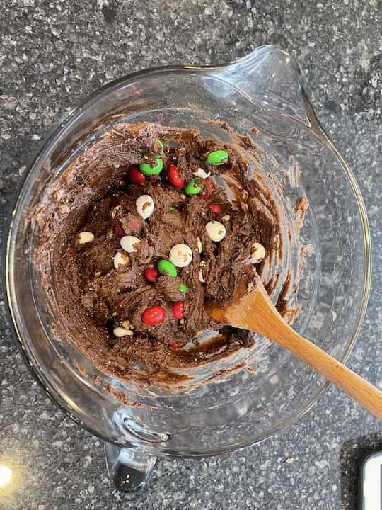 2.  Add chocolate Devil's Food Cake Mix and add-ins into the bowl and stir