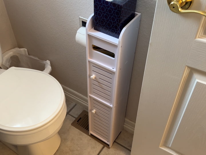 I purchased a small cabinet that can be used to be a toilet paper dispenser.  We had that already in our bathroom, and we are using it to hold some supplies that need to be closer to the toilet.