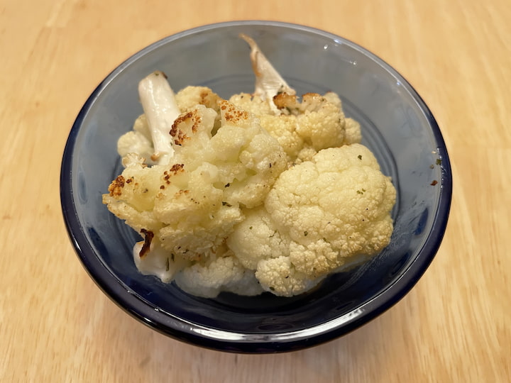 Remove the cauliflower from the oven, let it cool slightly, and serve.  You get that zingy ranch flavor - without the calories!