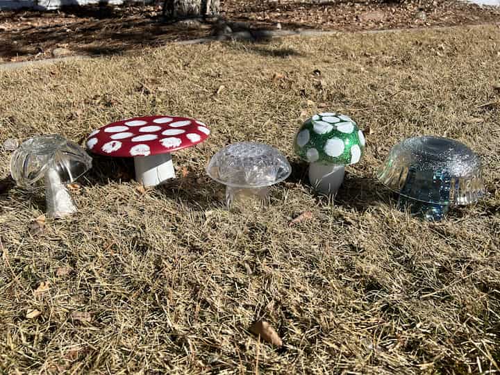 Have you ever wanted to make some DIY garden mushrooms?  All you need is a few items from the thrift store and you can make some on a budget.