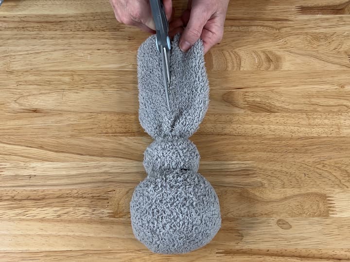 I cut down the center of the top of the sock to create 2 ears.  