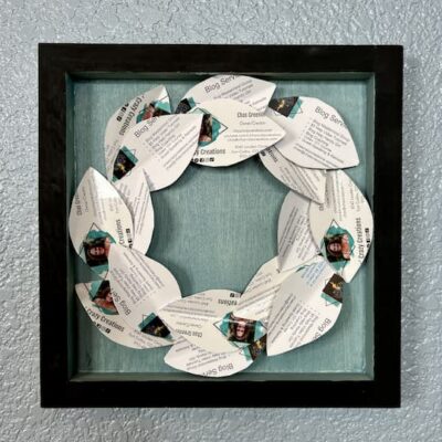 Do you want some recycled paper crafts? I took some old magazines and business cards and turned them into a lovely wreath for my home.