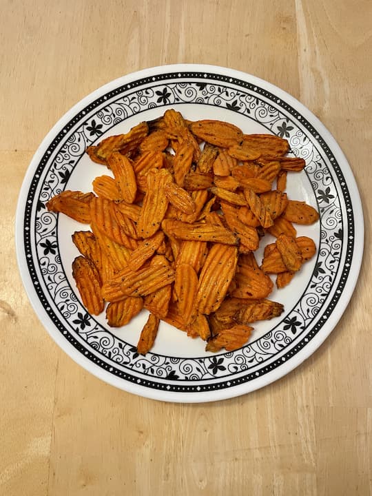 Do you want to make carrot chips?  I have an easy way to do them and my whole family ate them all up in a single sitting.
