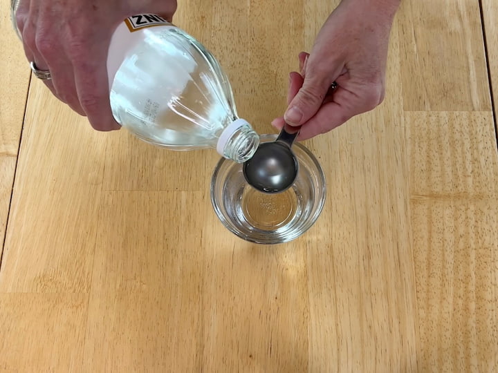 Add 1 tablespoon vinegar to the water.
