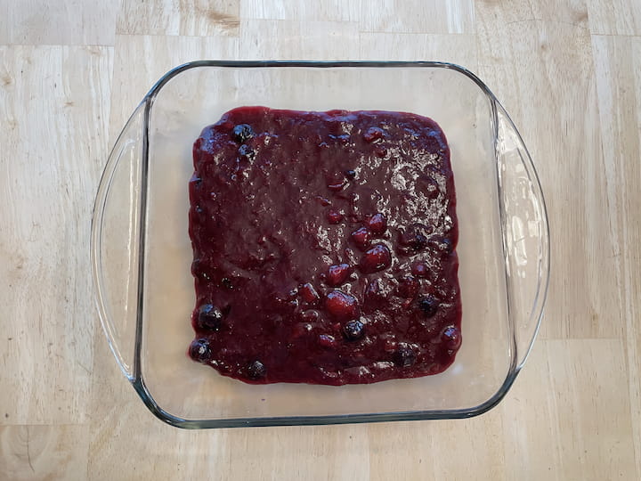 I placed graham crackers on the bottom of a square baking dish and poured the compote mixture on the top.  I placed it in the refrigerator to set and cool.