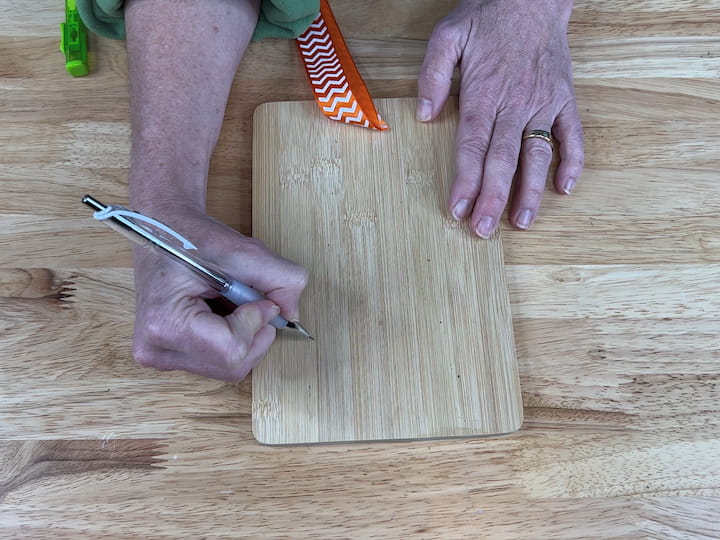 2. Place marks on the cutting board