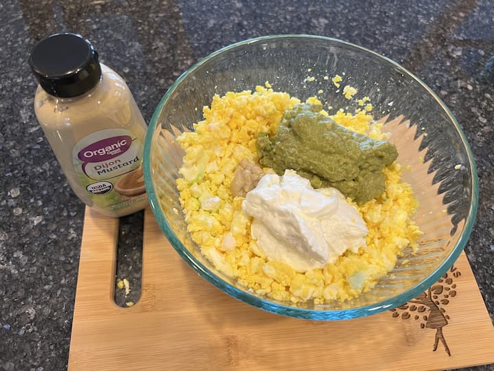 Add 1 Tablespoon dijon mustard and mix all of the ingredients together.  I found that I preferred about 3 tablespoons in this mixture, so feel free to adjust to your taste.  Add Salt and pepper to taste and mix everything together.