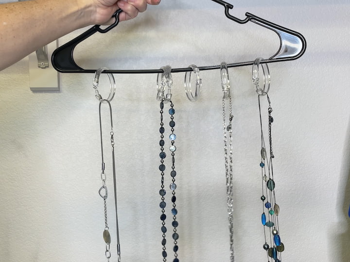 Place jewelry onto the shower curtain rings to keep jewelry from tangling.