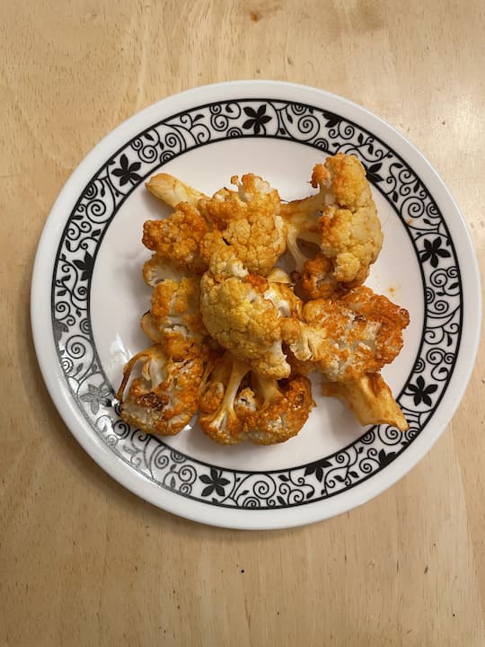 Do you want vegan wings?  I love buffalo wings and after a breast cancer diagnosis, I have moved to a more plant-based diet.  I made delicious wings out of cauliflower.
