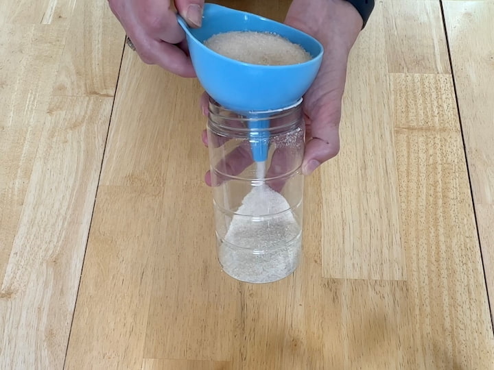 I poured sugar into one of the containers.  I can use the open side for baking, and the smaller side for pouring into coffee or tea.