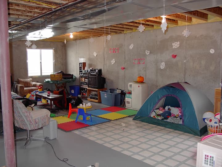 When we first moved into our home it was an unfinished basement.  We used our basement for storage and created a wonderful playroom space out of it.  No space in our home was unused.
