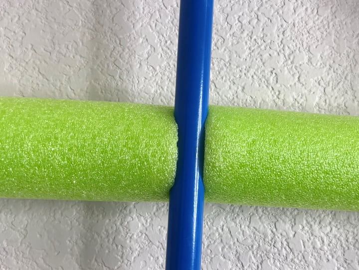 I waited the amount of time the instructions said before hanging anything into the noodle.  I pressed the handles of each of the cleaning items into the cut pool noodle.