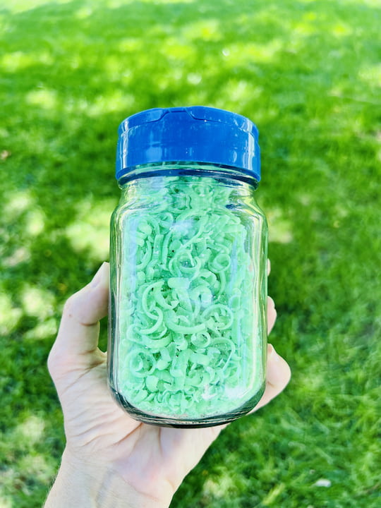 I like to keep mine in a mason jar with a recycled lid on. This allows me to open the bulk side, or the sprinkle side to get the desired amount out.