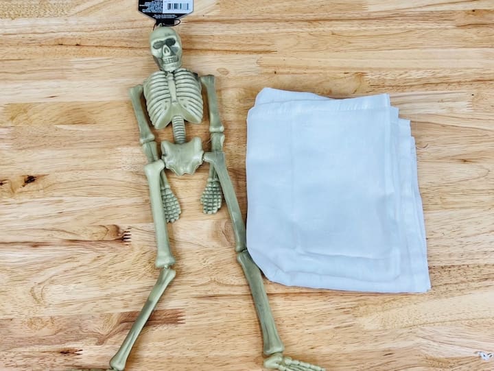 1. Cover the skeleton with a dish towel