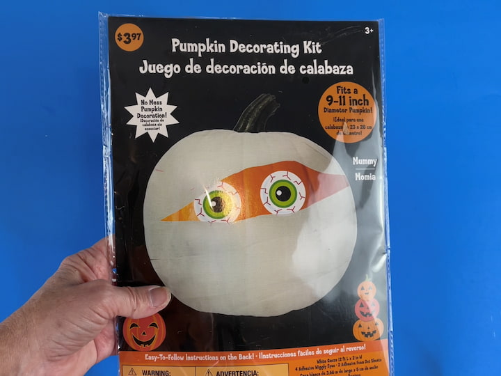 We will be making this fun Halloween craft using a doll to provide a basic mummy outline. I bought this Halloween kit for $3.97 at the store for making a mummy pumpkin