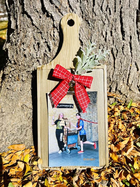 Next, I added a photo of my kids. This is such a simple project and a fun way to make a photo holder. The best part is you can personalize this with any photo, especially if this is a gift for others. This could easily be adjusted for any occasion.