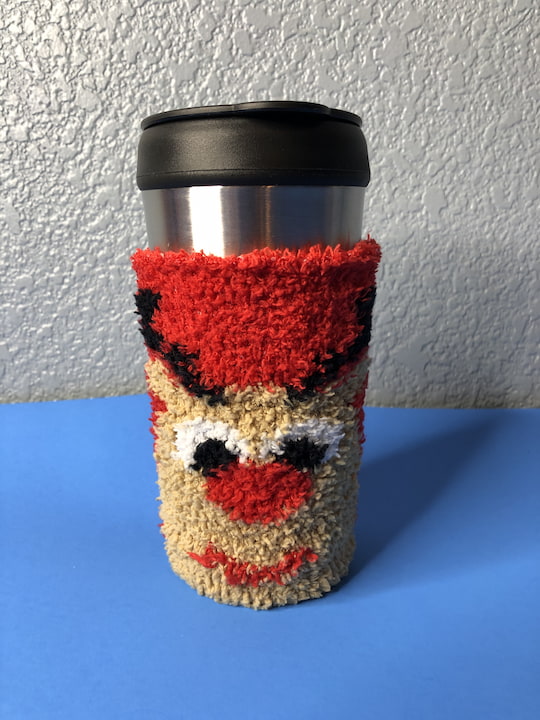 Are you looking for a coffee cozy? Here is an easy no sew DIY made with Dollar Tree items and it makes a fantastic gift.