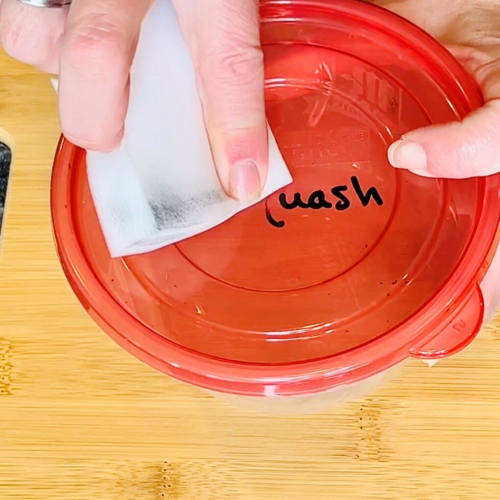 If you have permanent marker on top of a lid you can easily use a magic eraser to take the permanent marker off of that lid, as well these erasers also take the words off of plastic. You can also remove stains inside of plastic with these.