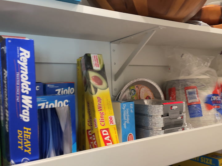 I put all of her food storage items together and I also put all the paper products together so they would be quick and easy to grab. I made sure the items she used on a regular basis were within easy reach. 