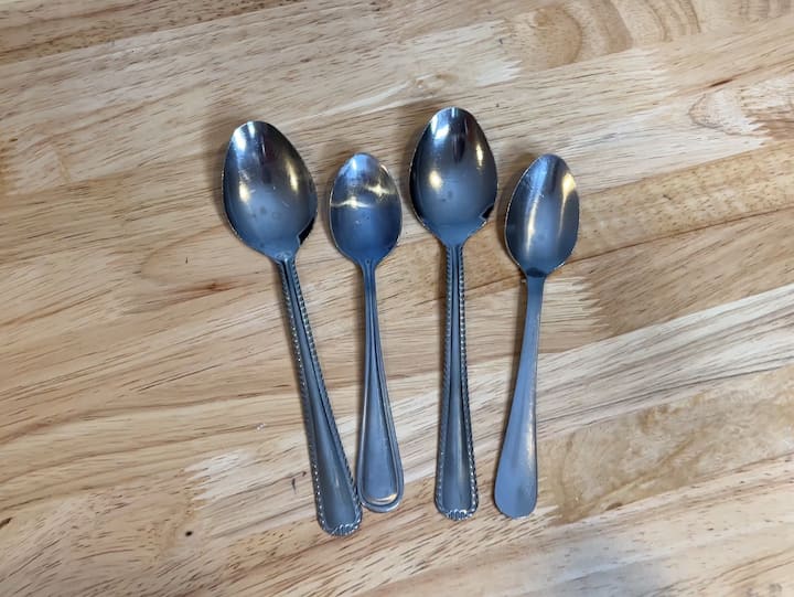 For this first project, you're going to need some spoons.  Now you want to have a flat surface to work with and you're going to want to clean it with some rubbing alcohol first.  