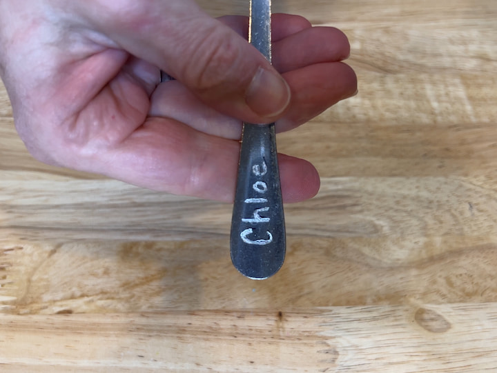 As you can see here it's permanently etched into the spoon now I'm just going to take a rubbing alcohol prep pad and clean off the rest of the marker.  This can easily be thrown into the dishwasher or anywhere you normally throw your silverware.  