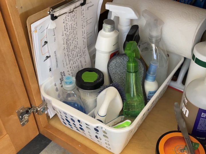 I use a basket underneath my sink to keep my cleaning supplies.