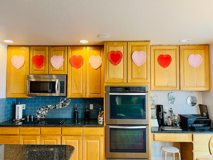 We'll start with the kitchen where you can see all the extra doilies that I had decorating the kitchen space.