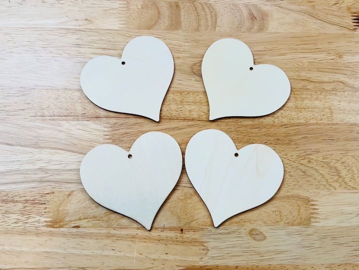 For this project, I'm using a package of dollar Store wooden hearts