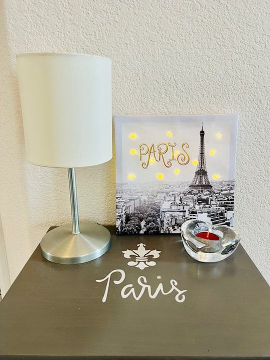 My light-up Paris sign goes nicely by my front door on my little side table that says Paris on it.  You can see my tutorial for my table at 