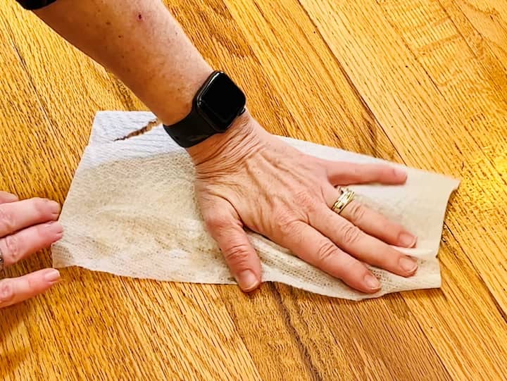 Scoop a paper towel right up against it spray it with just a little bit of water and then wipe all of that right up and throw it away.