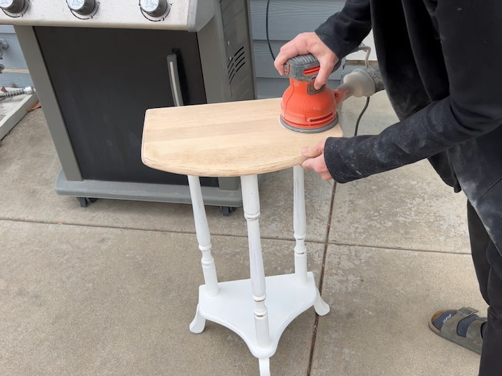 Once I had messed around with this table enough I decided that I wanted to sand the tabletop all the way down to the wood to match another accent table in the living room that I'd done in a previous video.
