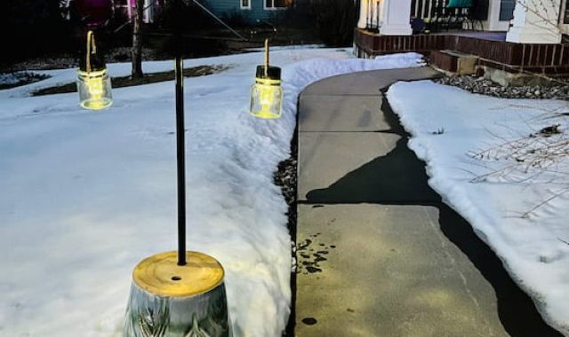 Do you want a DIY solar light post? With just a few inexpensive materials you can make your own and save tons of money!