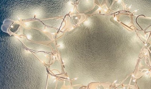 How do you make a plastic hanger star? With just a few supplies from Dollar Tree, I made this easy star on a budget. It even that lights!