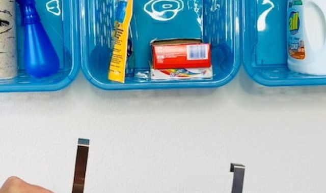5. Bonus small laundry room hack, add a hanging cabinet rack on your shelf.