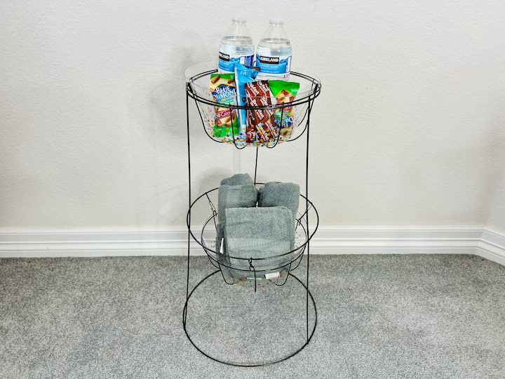 Use it in your guest room.  I'm placing some water and some snacks on the top and some washcloths and hand towels on the bottom.  this is great for the guest room and now your guests will have everything they need at their fingertips. 
