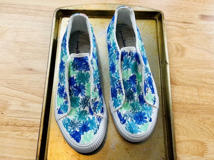 Pick a variety of Sharpie colors and start coloring your shoes in circles or blotches. Make sure to cover the entire surface of the shoes with ink.