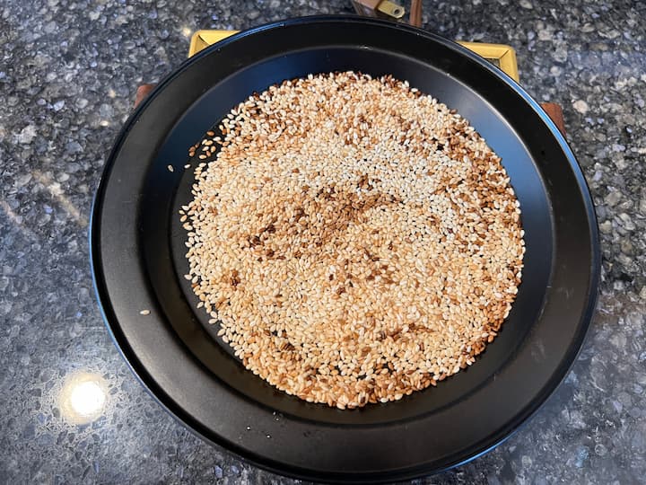 Toast the 1/8 cup of sesame seeds and add them to the bowl with the rest of the ingredients.
