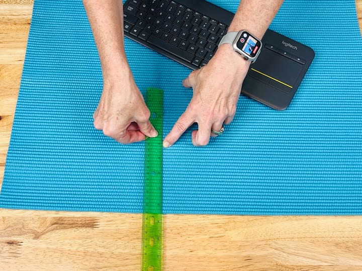 Create a wrist rest for your keyboard. Measure your desk size, cut the mat accordingly, fold it in half, and hot glue the three edges closed.