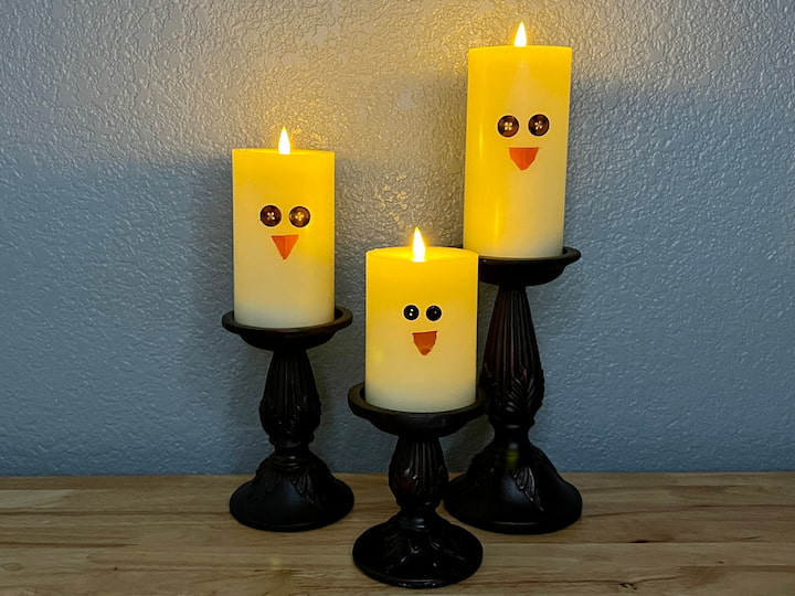 Create a delightful spring vignette by placing these charming chick-themed candles on a tray adorned with eucalyptus branches and other embellishments.