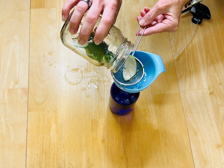 3.	After a week, strain the mixture and pour it into a spray bottle using a funnel.