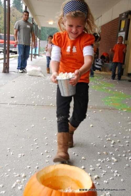Fill up the Pumpkin with Popcorn Races a girl running happily smiled