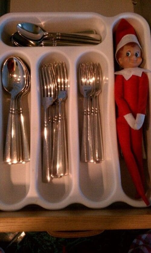 Elf on the Shelf Hiding With the Silverware
