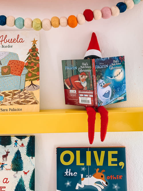 Elf on the Shelf Reads a Christmas Book