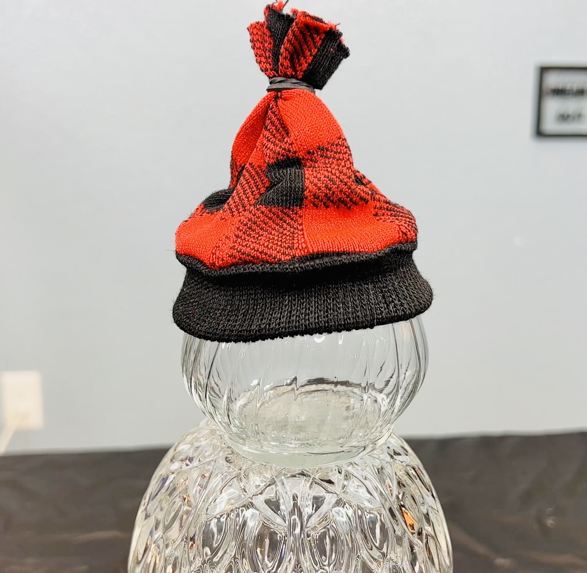 Option 1: Set the glass piece on top and add your sock "hat" to make it a Snowman.