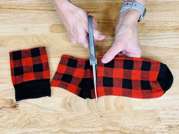 Cut the top and bottom sections off a sock.