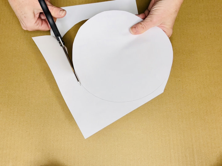 Cut Out the Circle: Use scissors to carefully cut out the entire circle, following the traced outline.