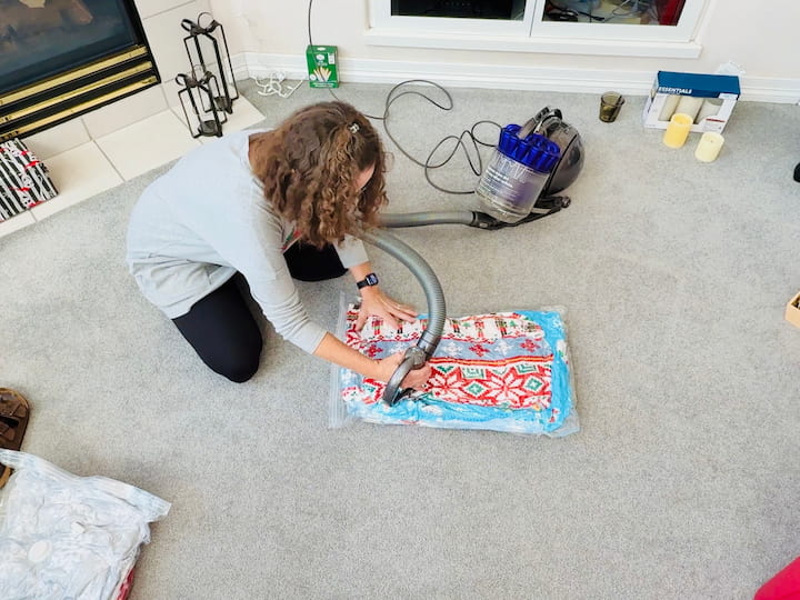 Chas using vacuum seal bag for compressed holiday storage