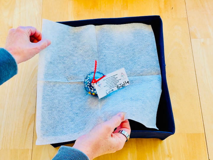 wrapping ornament with napkin