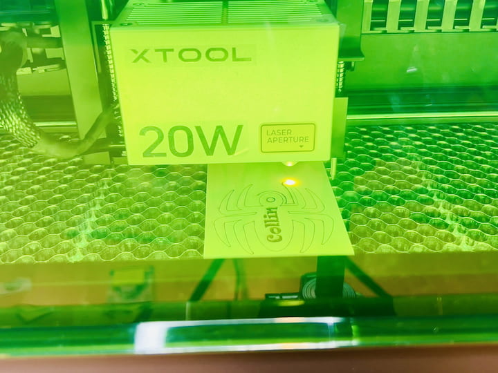 Step 3: Process and Let the Machine Decide After setting up your spider design, process it using the X Tool S1 laser cutter. Unlike the dolphin ornament, this time let the machine choose the order of operations. It might start with engraving, followed by scoring, and then cutting.