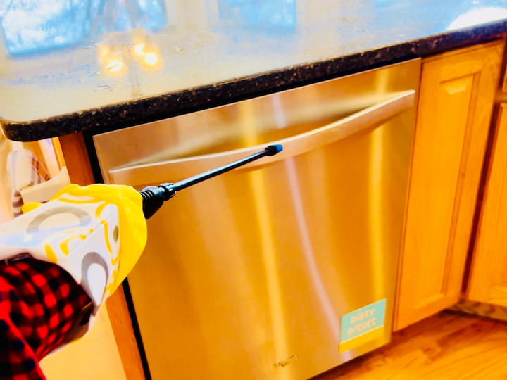 And don't forget to use it on your dishwasher. You can spray the outside of the dishwasher with a disinfectant spray, but you can also open it up and spray the inside, hitting all of those areas that sometimes collect those nasty smells.